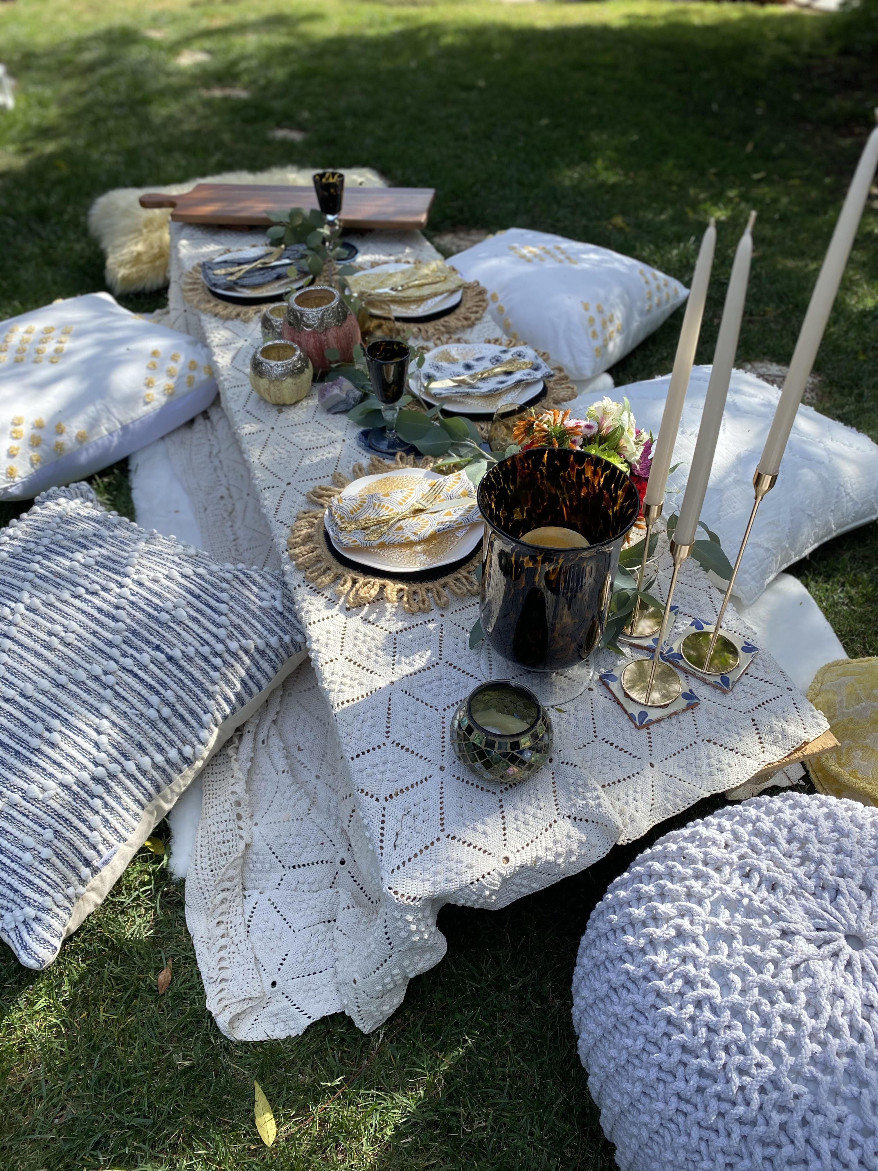 Outdoor low table spread for glamorous picnic or dinner
